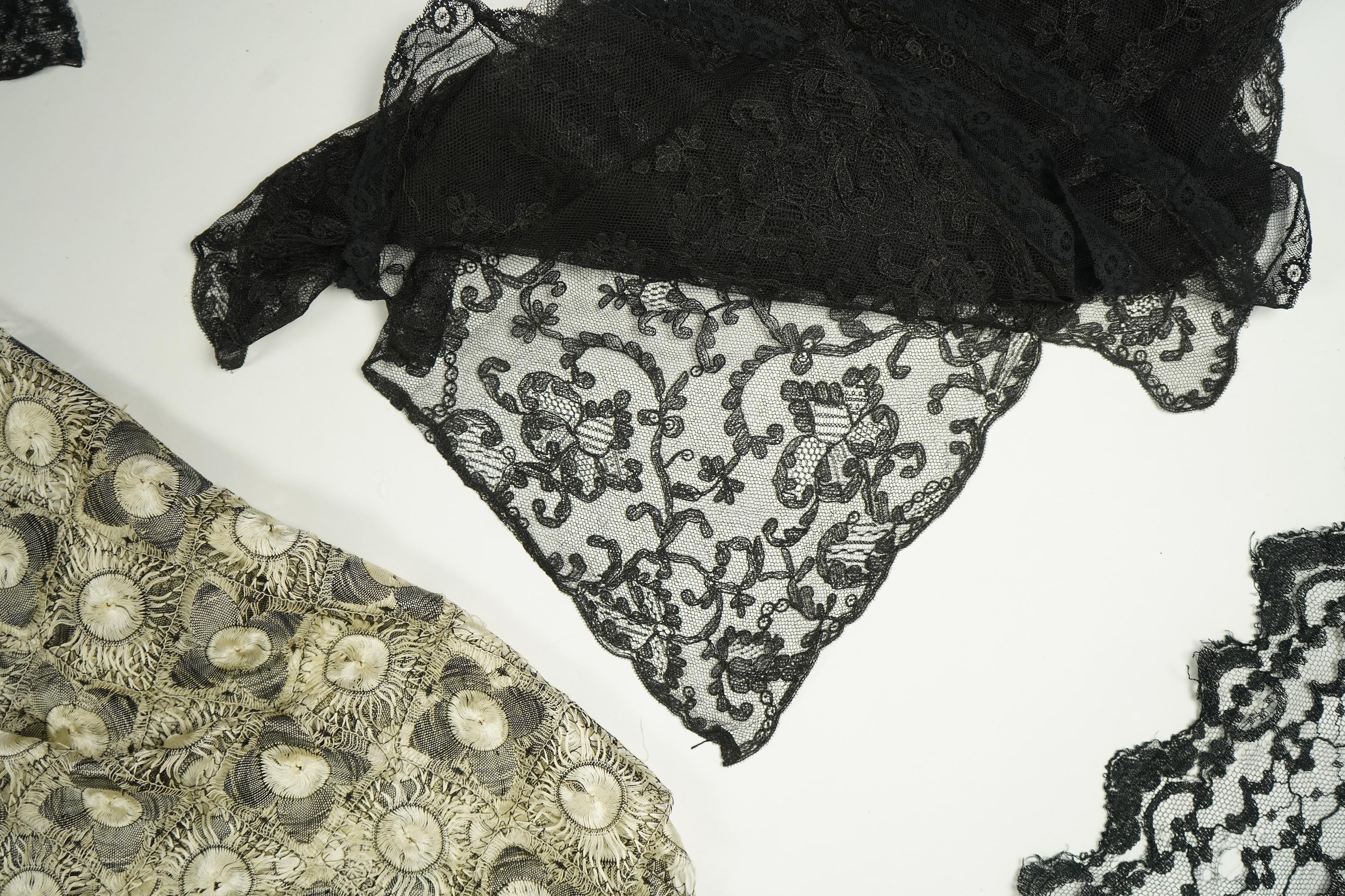 A fine cream and black silk ‘tatting’ stole, two black silk stoles, two bonnet veils and various collars and small triangular mantilla etc. Condition - some damage to bonnet veil., Tatting stole 184cm long.